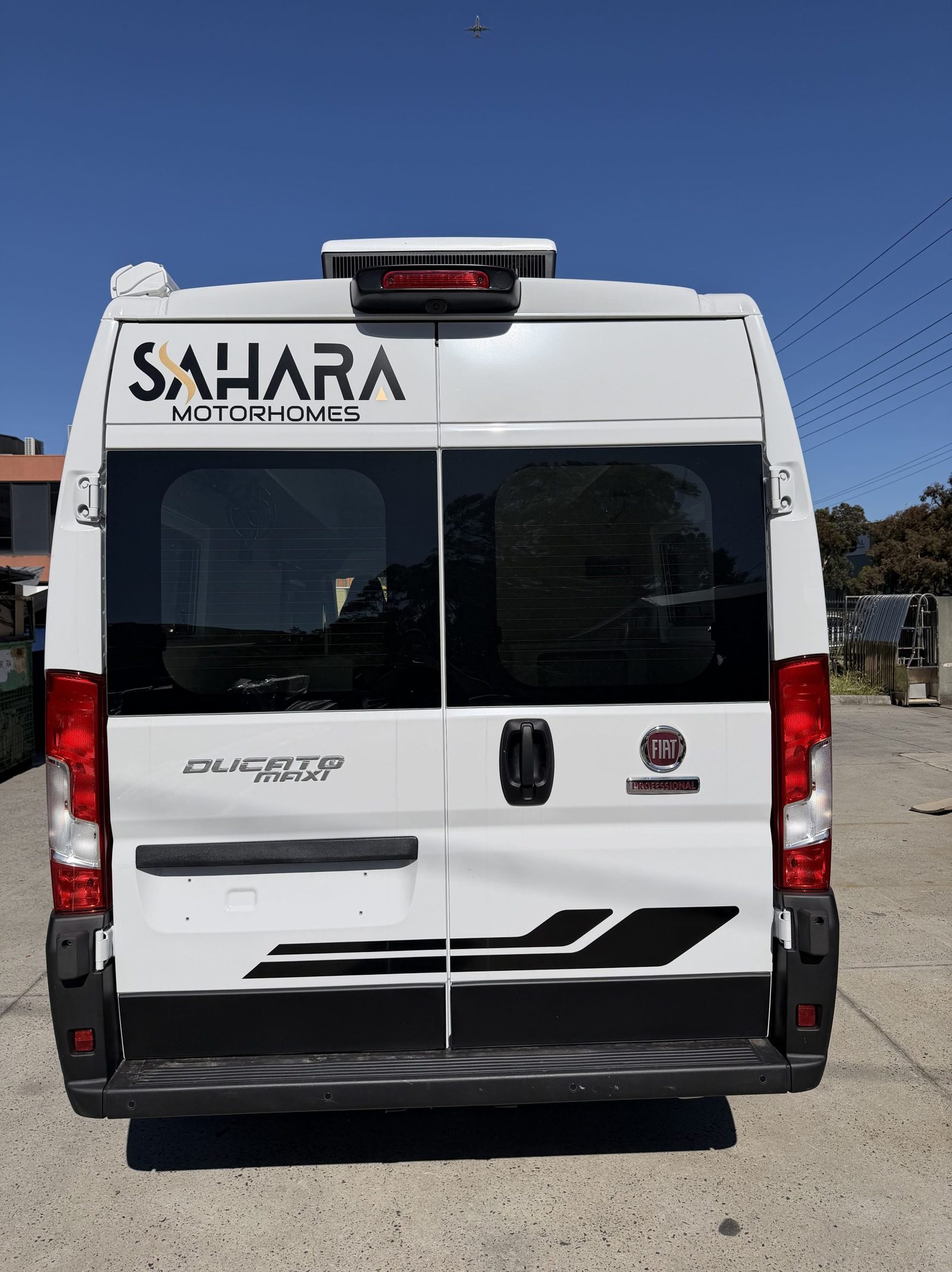 Cabinetry and hand-finished joinery inside a Sahara van